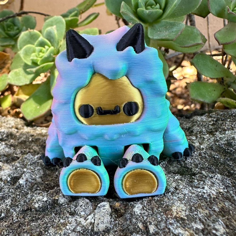 Colorful Yeti Monster Toy with Gold Face